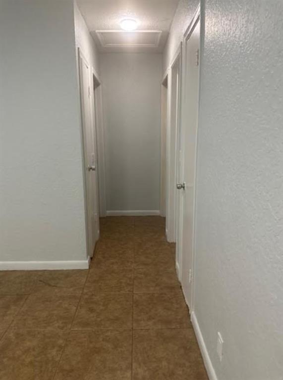 332 Southwest 2nd Place, Unit 3 Pompano Beach, FL 33060 - Photo 3 of 11 a view of a hallway