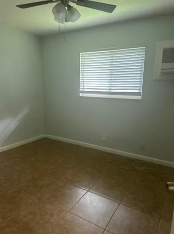 a view of a room that has a window in it