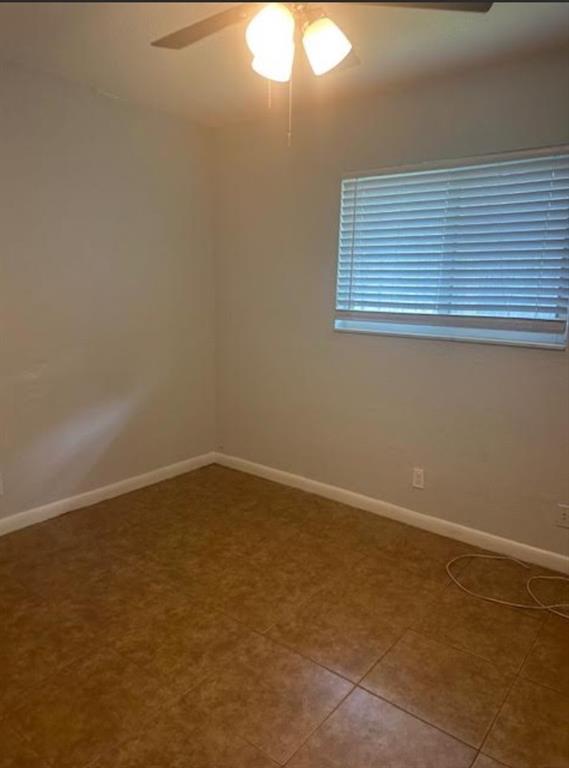 332 Southwest 2nd Place, Unit 3 Pompano Beach, FL 33060 - Photo 9 of 11 a view of an empty room