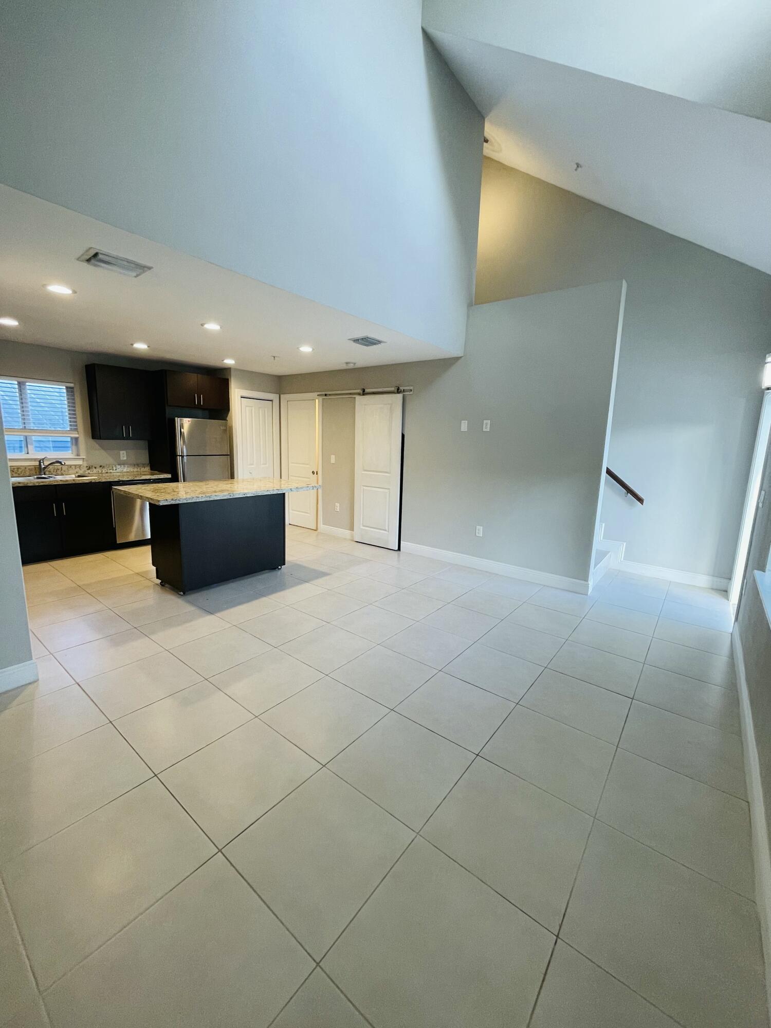 102940 Overseas Highway, Unit 2 Key Largo, FL 33037 - Photo 20 of 39 a view of a kitchen with kitchen and counter top