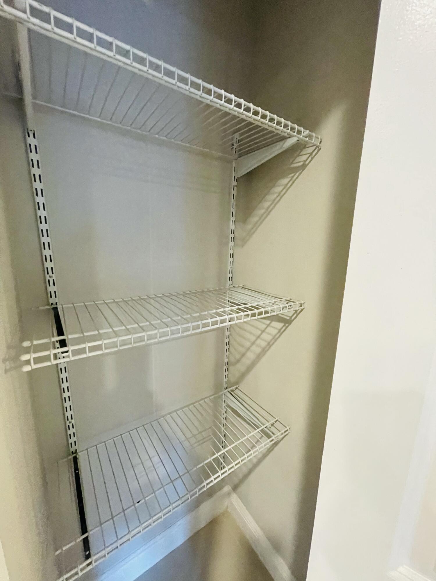 102940 Overseas Highway, Unit 2 Key Largo, FL 33037 - Photo 29 of 39 a view of a room with wooden floor