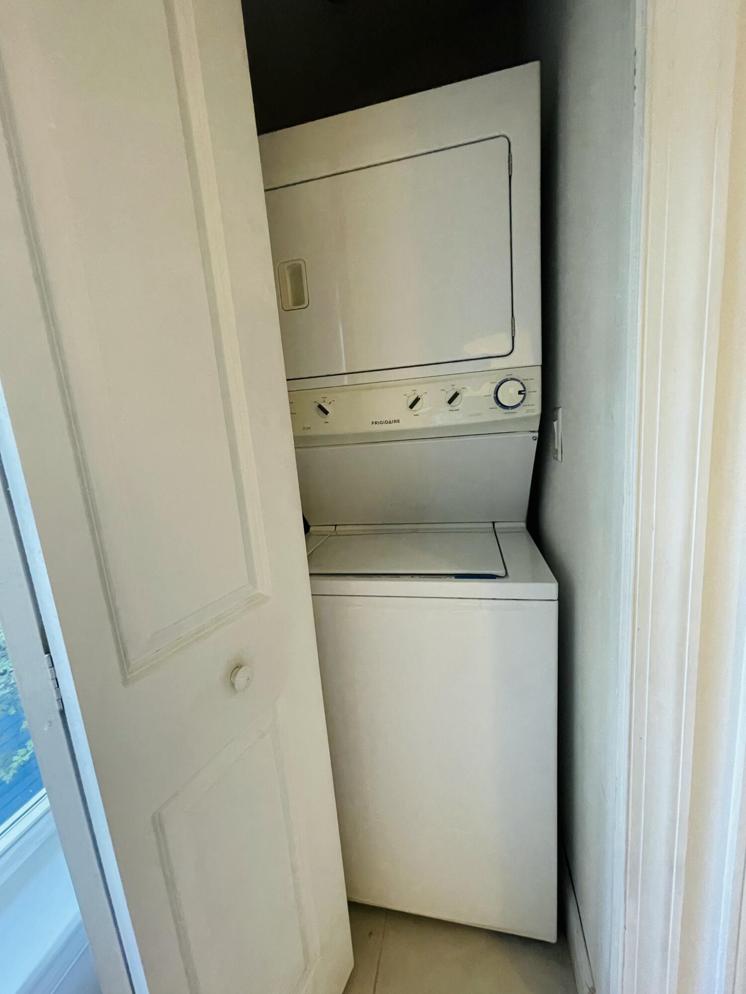 102940 Overseas Highway, Unit 2 Key Largo, FL 33037 - Photo 38 of 39 a utility room with dryer and washer