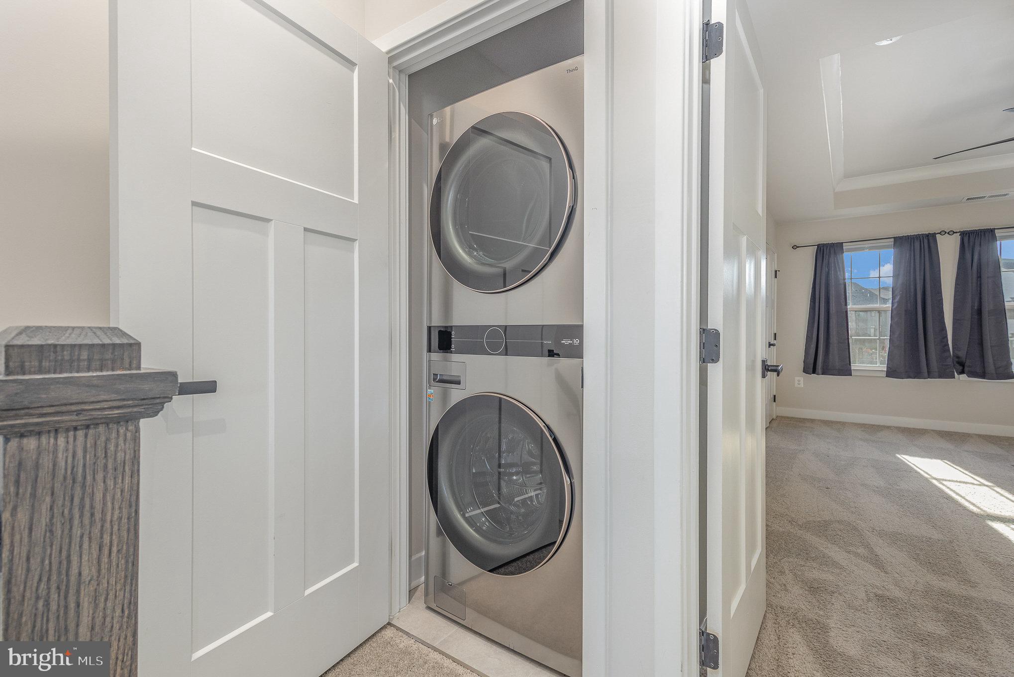 1002 Alum Spring Road Fredericksburg, VA 22401 - Photo 15 of 23 a view of a hallway with washer and dryer