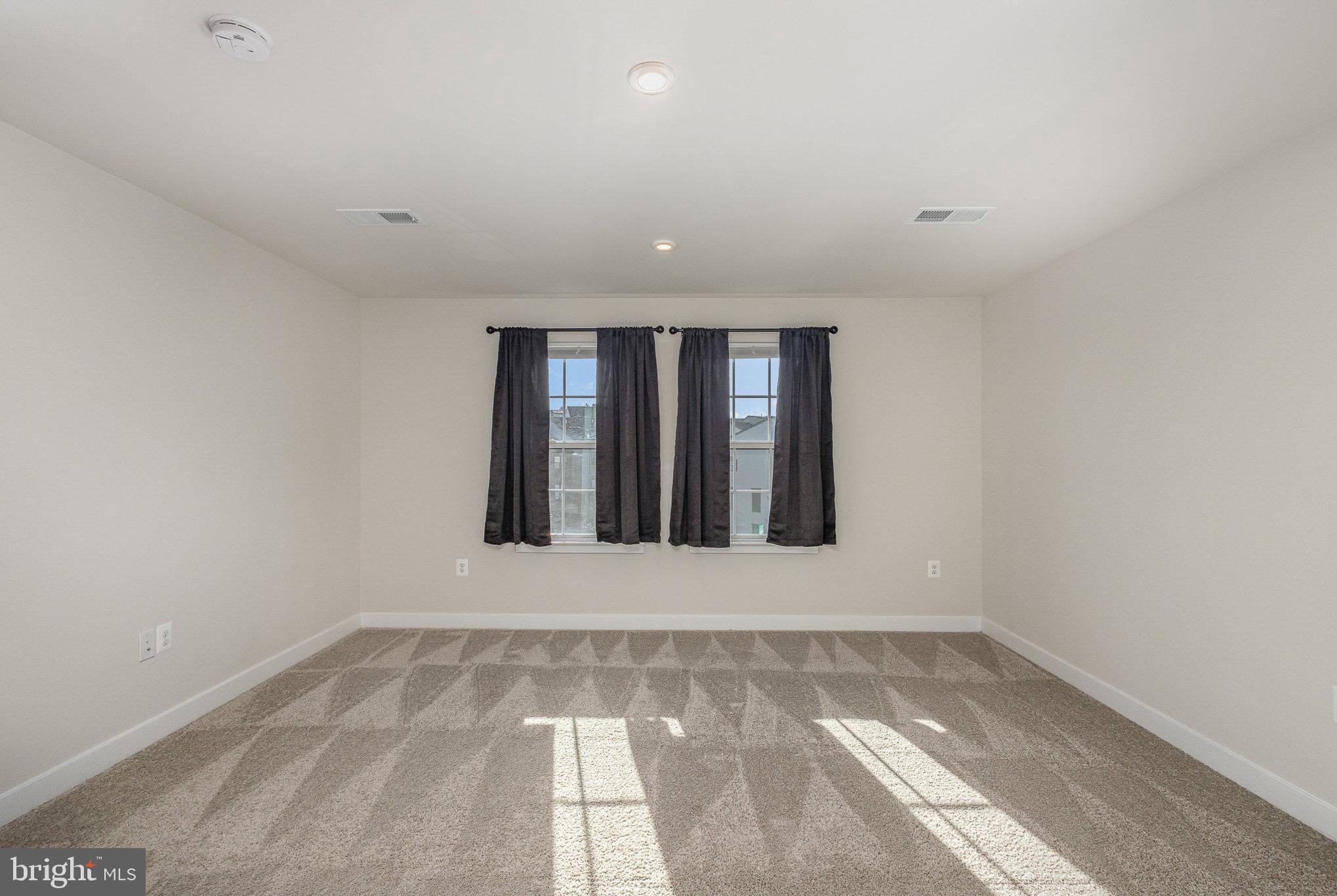 1002 Alum Spring Road Fredericksburg, VA 22401 - Photo 18 of 23 an empty room with a window