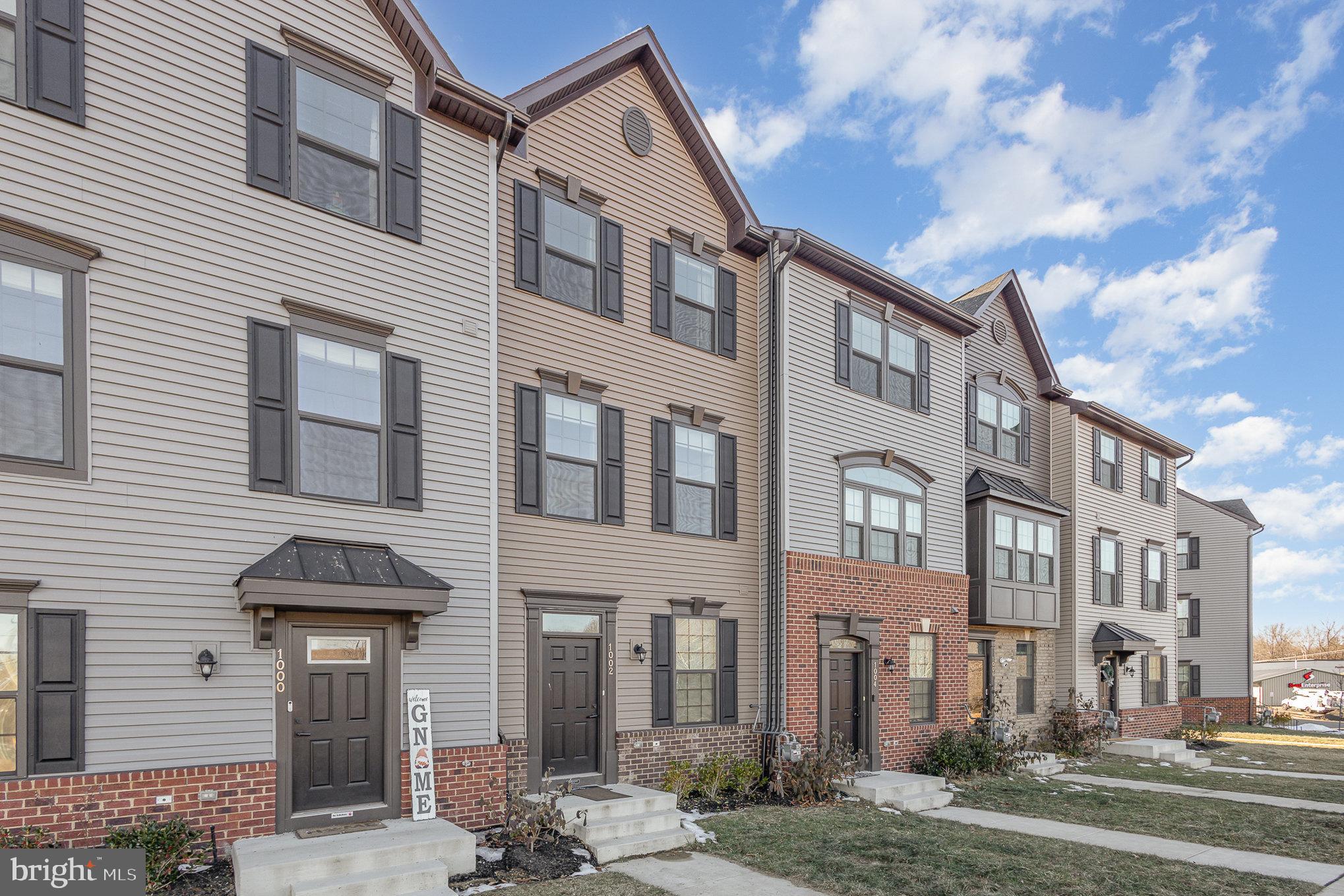 1002 Alum Spring Road Fredericksburg, VA 22401 - Photo 2 of 23 a front view of a building and a street