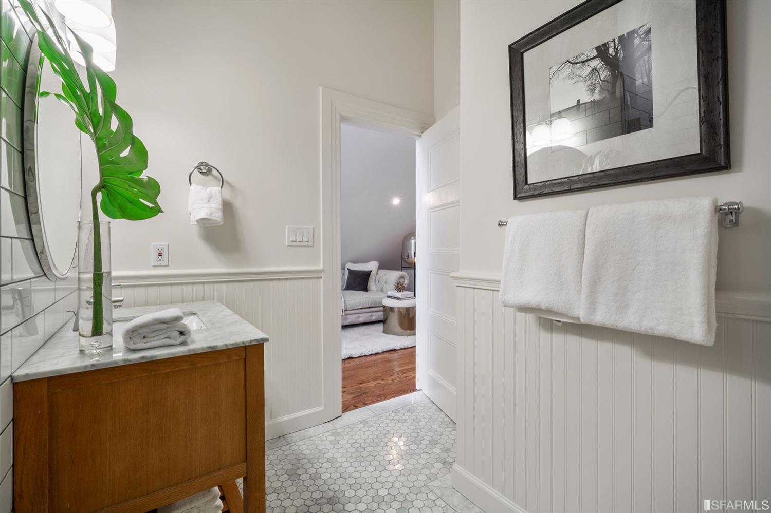 617 Broderick Street, Unit B San Francisco, CA 94117 - Photo 16 of 36 a view of hallway with furniture and a potted plant