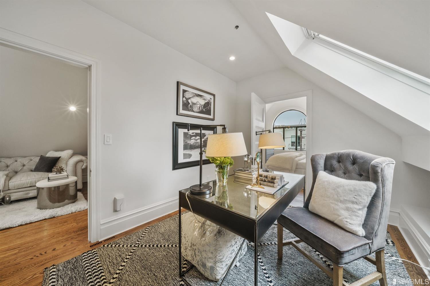 617 Broderick Street, Unit B San Francisco, CA 94117 - Photo 18 of 36 a living room with furniture and wooden floor