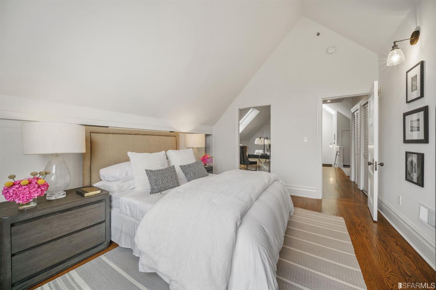 617 Broderick Street, Unit B San Francisco, CA 94117 - Photo 20 of 36 a bed room with a bed and a couch