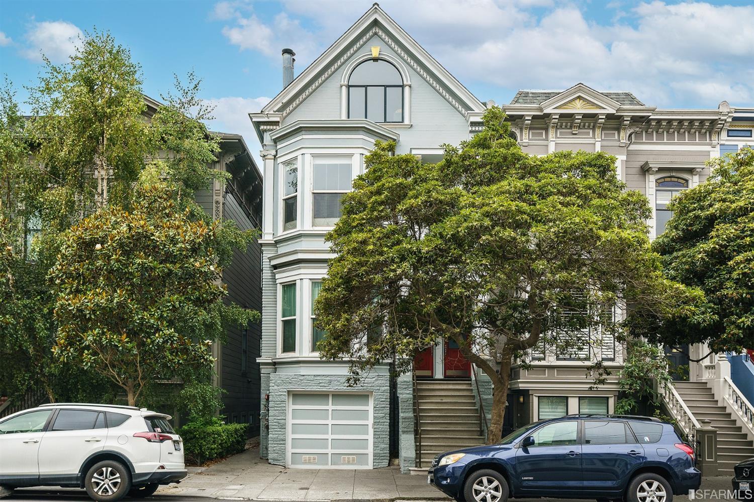 617 Broderick Street, Unit B San Francisco, CA 94117 - Photo 3 of 36 a front view of a house with parking