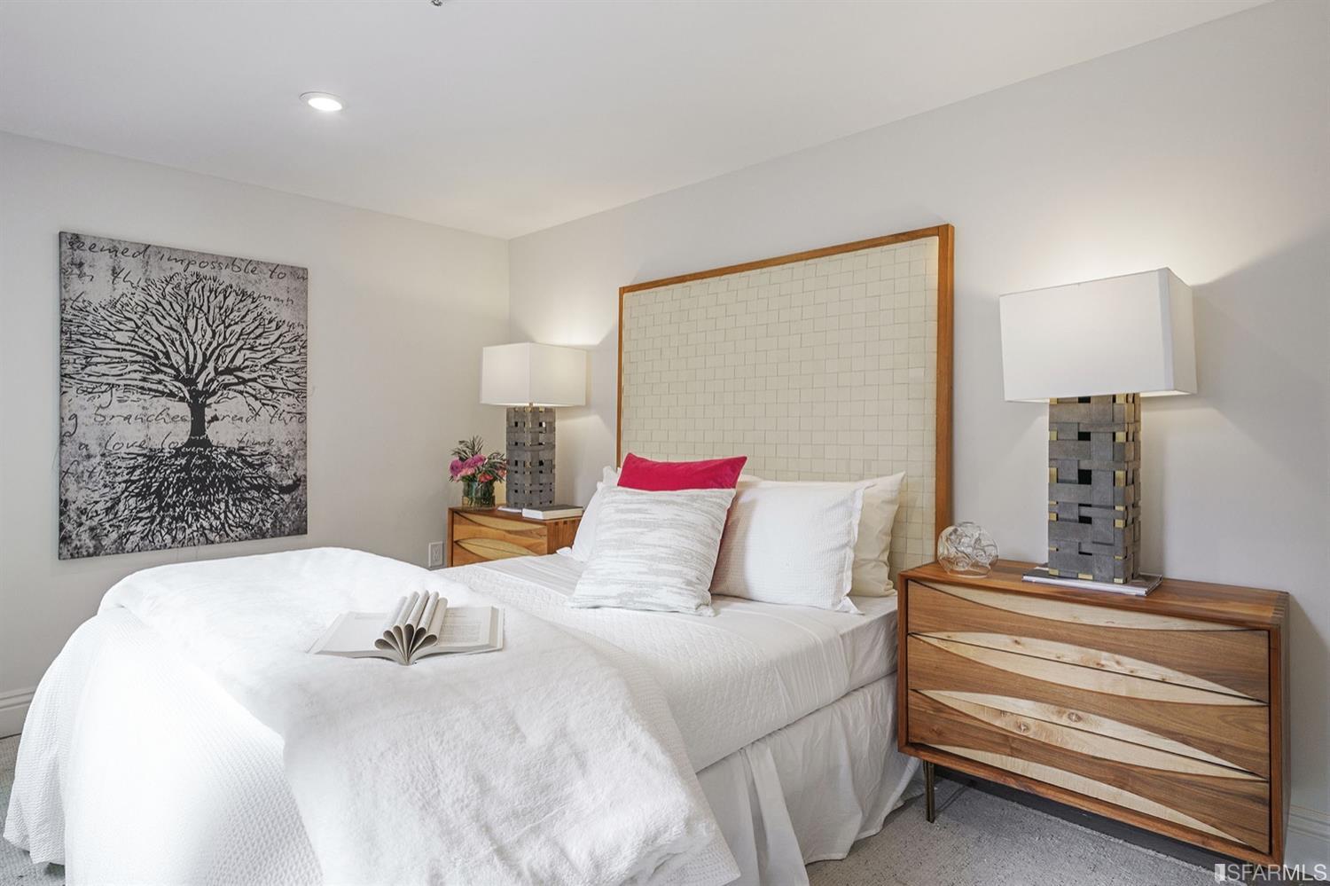 617 Broderick Street, Unit B San Francisco, CA 94117 - Photo 27 of 36 a bedroom with a bed and a lamp