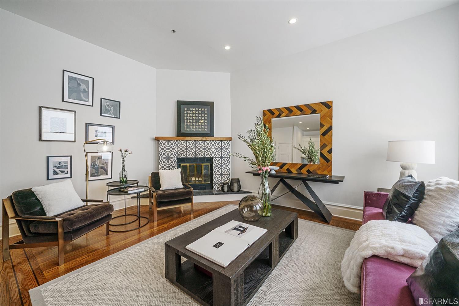 617 Broderick Street, Unit B San Francisco, CA 94117 - Photo 4 of 36 a living room with furniture and a fireplace