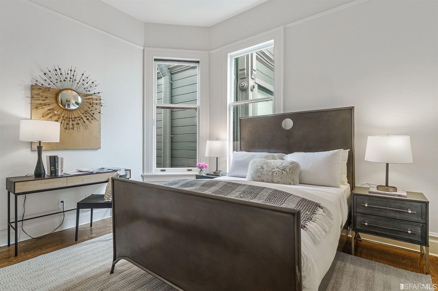 617 Broderick Street, Unit B San Francisco, CA 94117 - Photo 10 of 36 a bedroom with a bed and a window