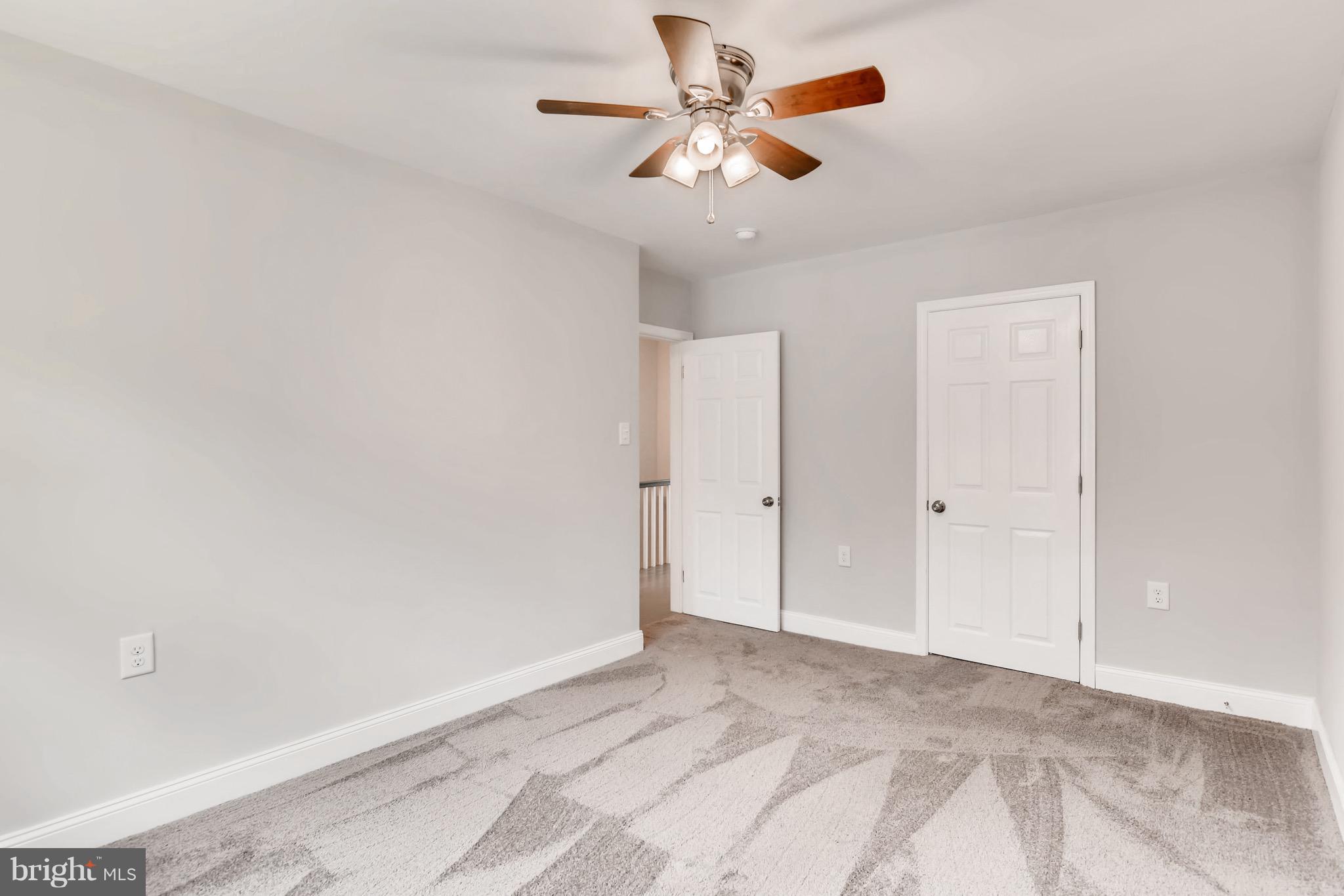 1315 Silverthorne Road Baltimore, MD 21239 - Photo 17 of 28 a view of a big room with carpet