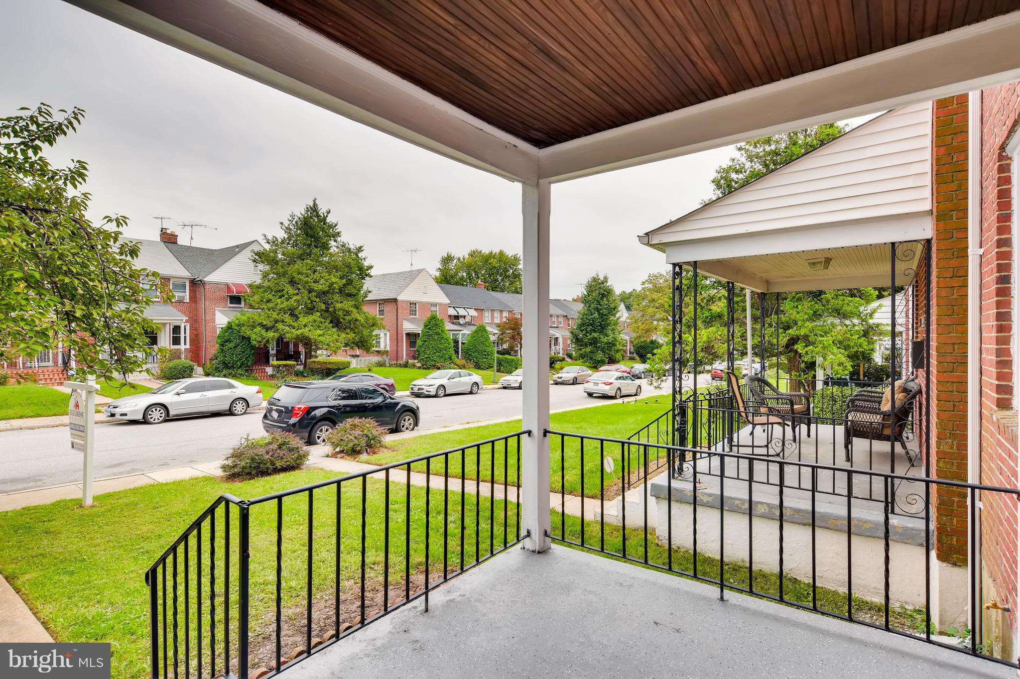 1315 Silverthorne Road Baltimore, MD 21239 - Photo 22 of 28 a view of a porch and garden