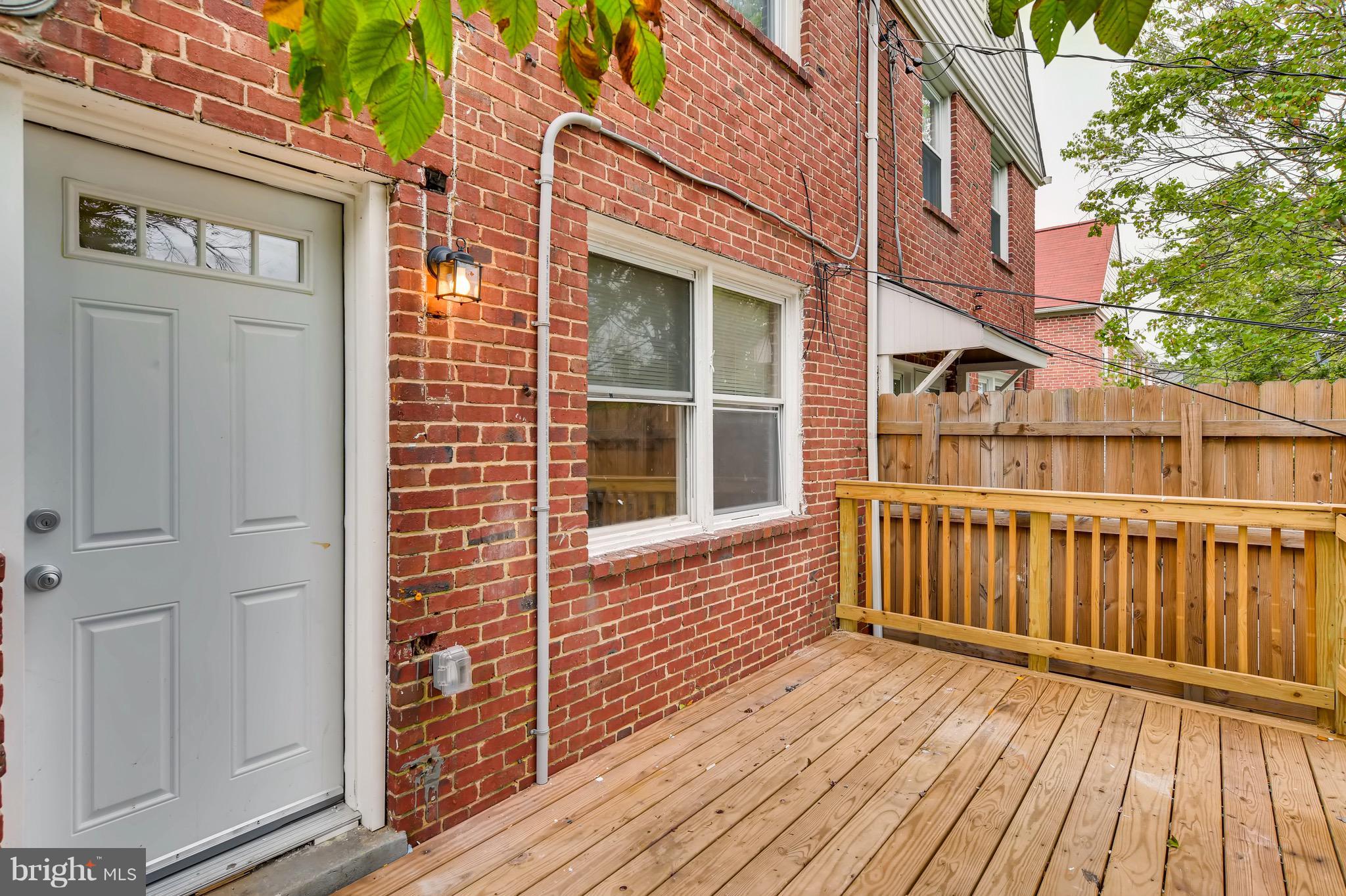 1315 Silverthorne Road Baltimore, MD 21239 - Photo 26 of 28 a view of wooden balcony
