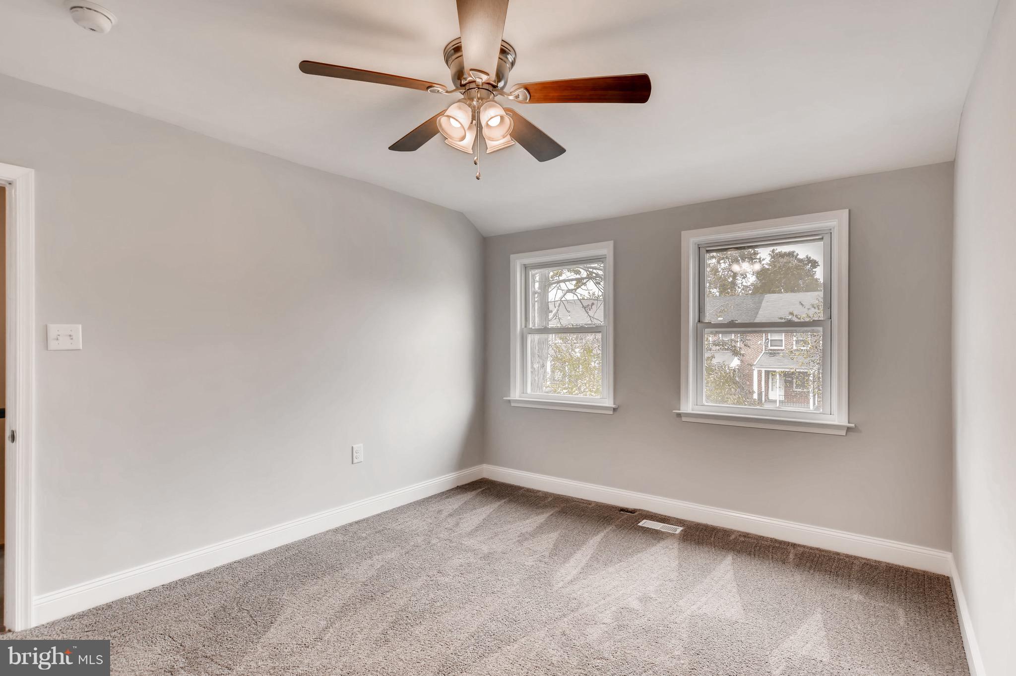 1315 Silverthorne Road Baltimore, MD 21239 - Photo 10 of 28 a view of an empty room with a window