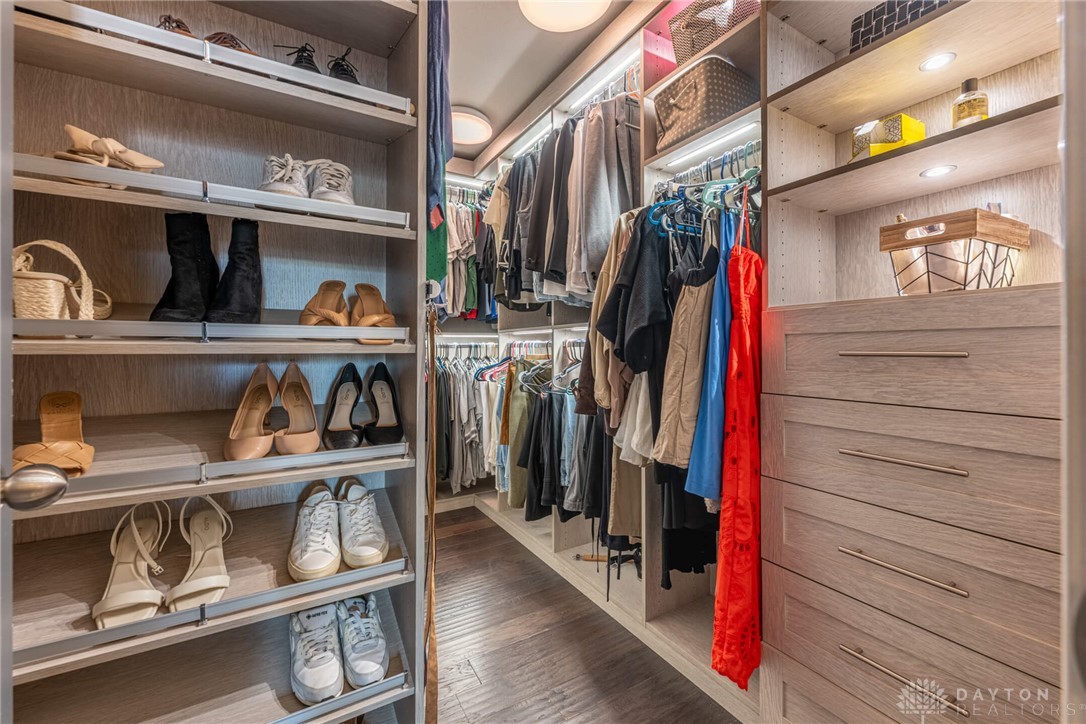 407 Brownstone Row Springboro, OH 45066 - Photo 32 of 54 This spacious walk-in closet offers ample storage and sophisticated design.