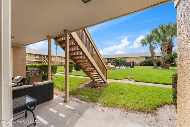 a view of a garden with a slide