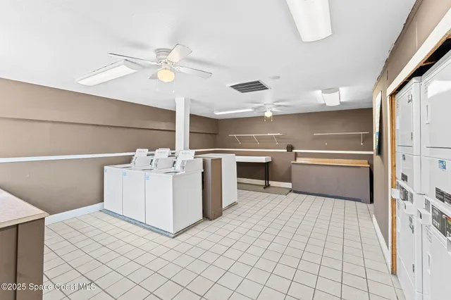 a kitchen with a sink cabinets and window