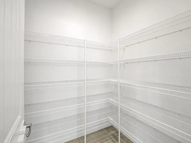 a view of a room with storage and racks