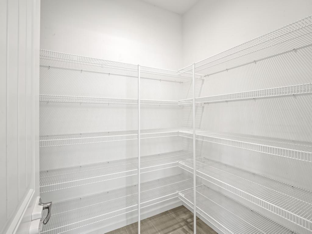 3438 Lincoln Avenue Clovis, CA 93619 - Photo 16 of 52 a view of a room with storage and racks