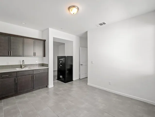 a large bathroom with a sink and a bathtub