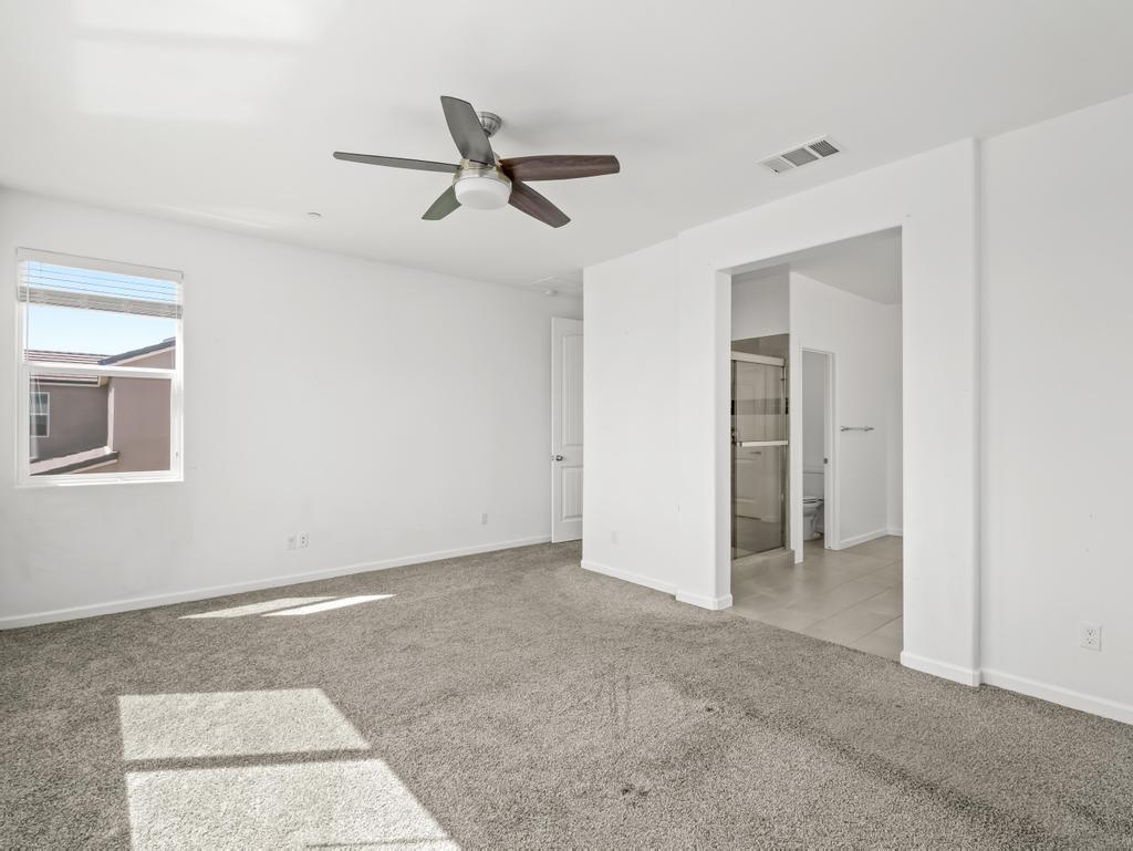 3438 Lincoln Avenue Clovis, CA 93619 - Photo 29 of 52 a view of a livingroom with a ceiling fan and window