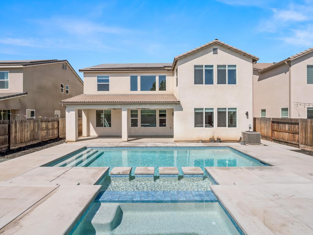 3438 Lincoln Avenue Clovis, CA 93619 - Photo 42 of 52 a front view of a house with garden
