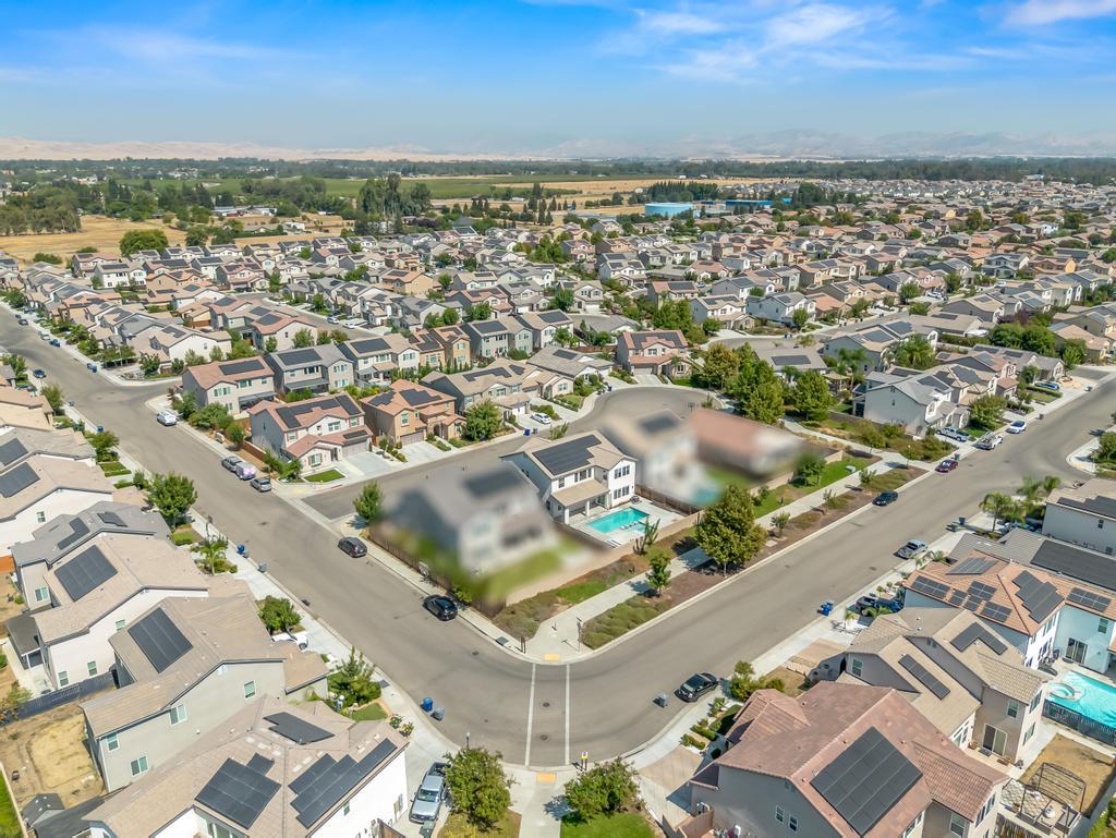 3438 Lincoln Avenue Clovis, CA 93619 - Photo 51 of 52 an aerial view of residential building and lake
