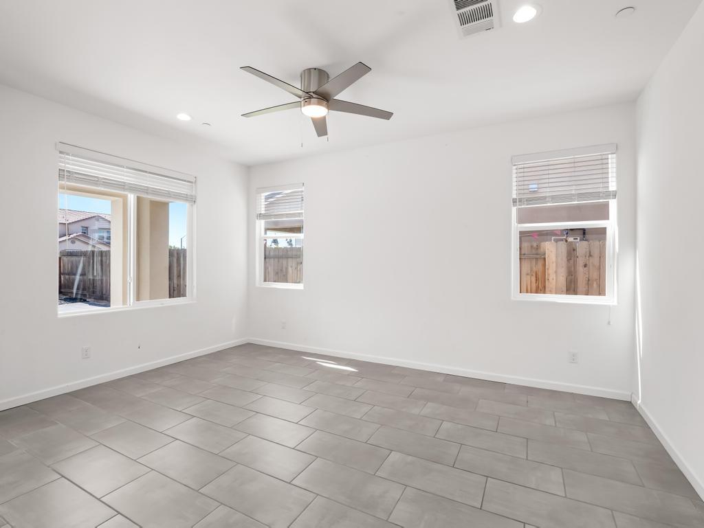 3438 Lincoln Avenue Clovis, CA 93619 - Photo 6 of 52 a view of an empty room with a window