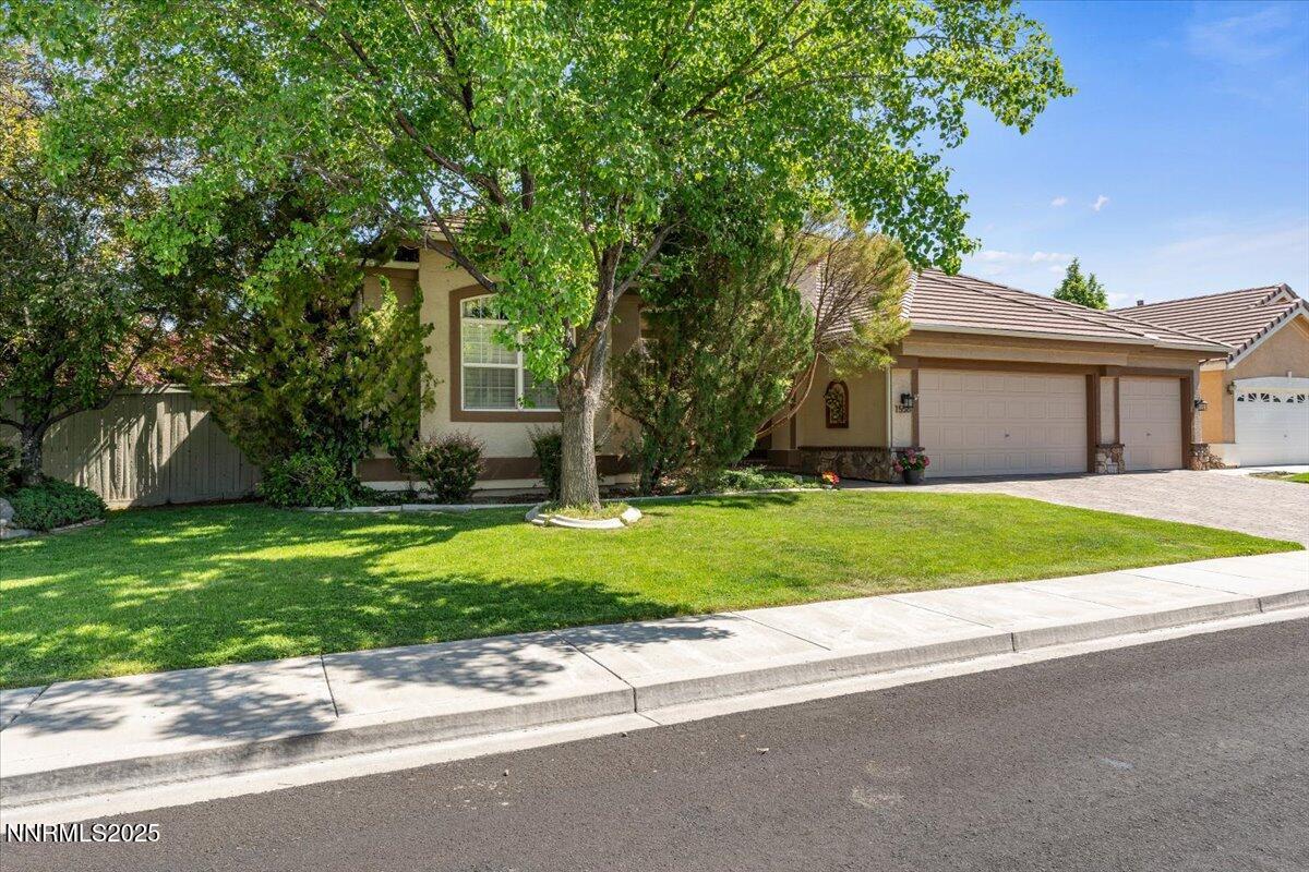 1556 Diamond Country Drive Reno, NV 89521 - Photo 1 of 29 front view of house with a yard