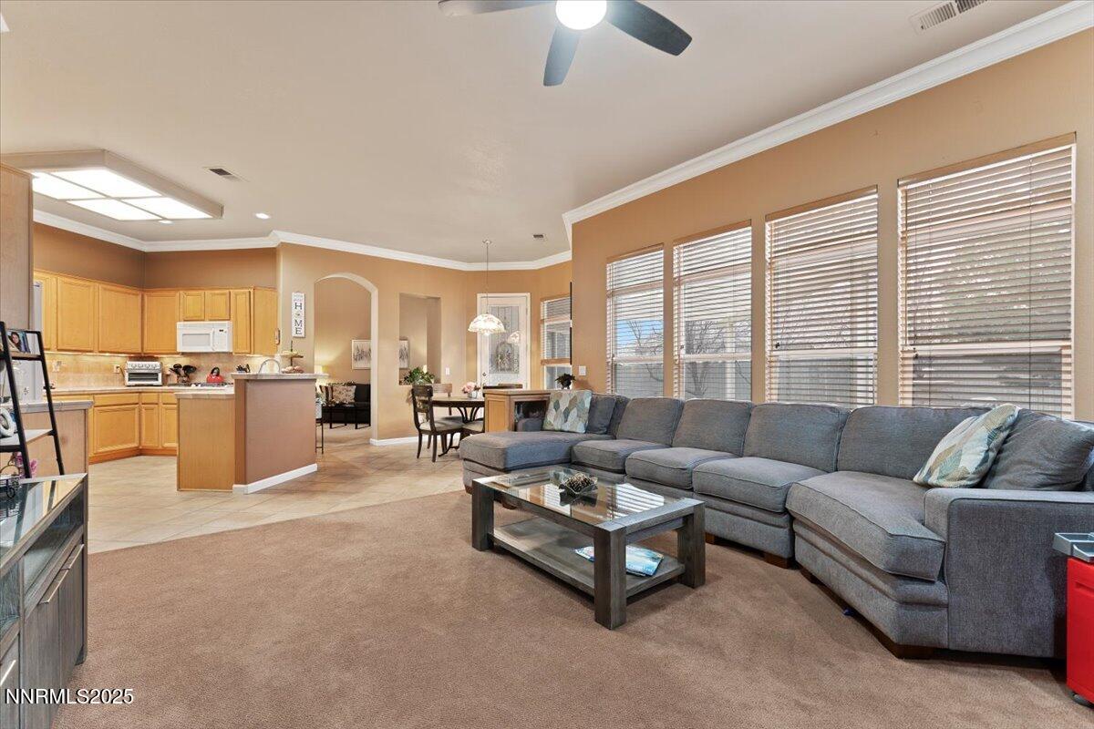 1556 Diamond Country Drive Reno, NV 89521 - Photo 3 of 29 a living room with furniture and a large window