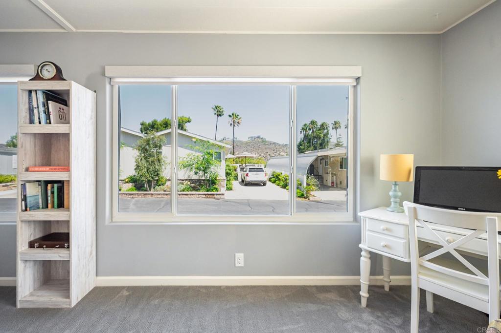4650 Dulin Road, Unit 42 Fallbrook, CA 92003 - Photo 14 of 45 a potted plant sitting on top of a wooden table