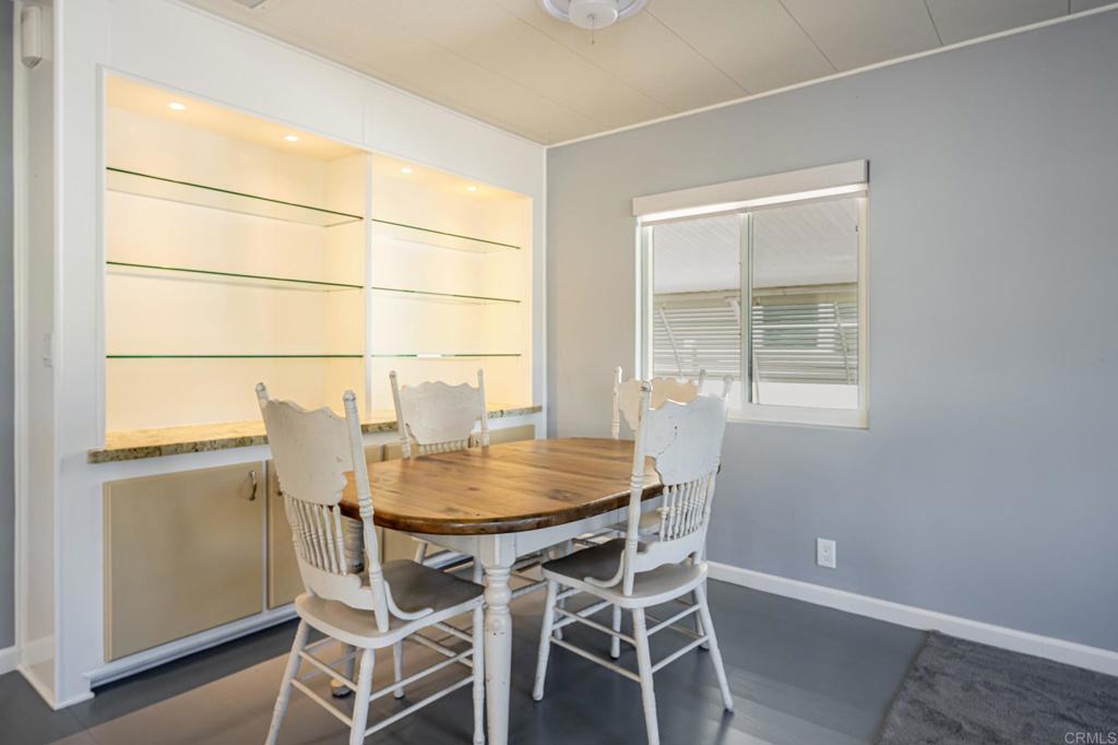 4650 Dulin Road, Unit 42 Fallbrook, CA 92003 - Photo 16 of 45 a dining room with furniture and window