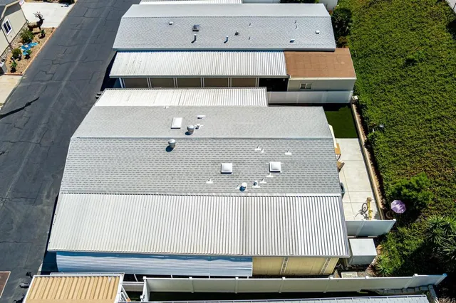 an aerial view of a city with lots of residential buildings