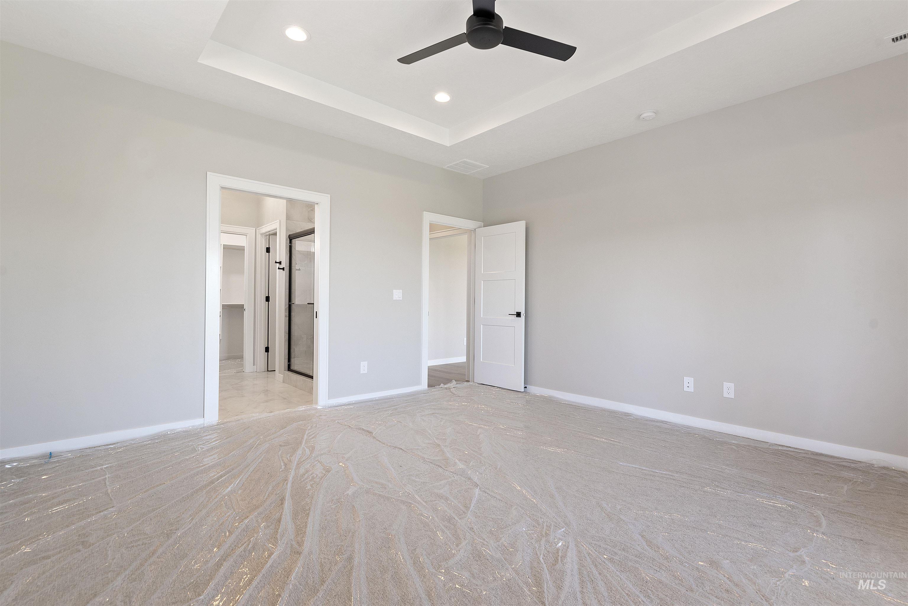 1935 West Bittern Street Nampa, ID 83686 - Photo 19 of 29 Unfurnished bedroom with a raised ceiling, recessed lighting, and a ceiling fan