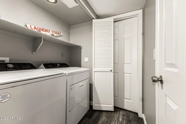 a utility room with dryer and washer