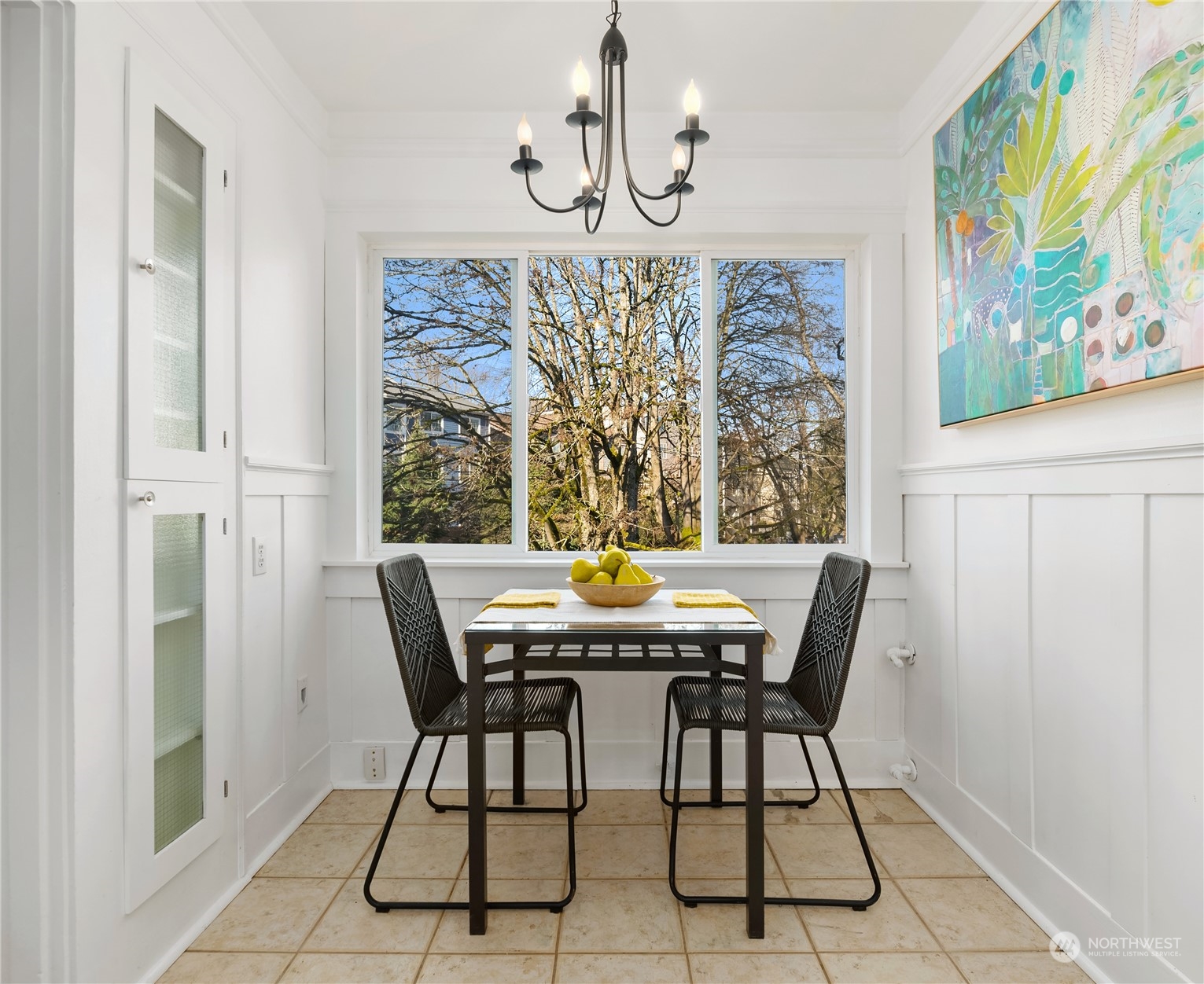 1640 18th Avenue, Unit 5 Seattle, WA 98122 - Photo 11 of 19 a view of a dining room with furniture window and wooden floor