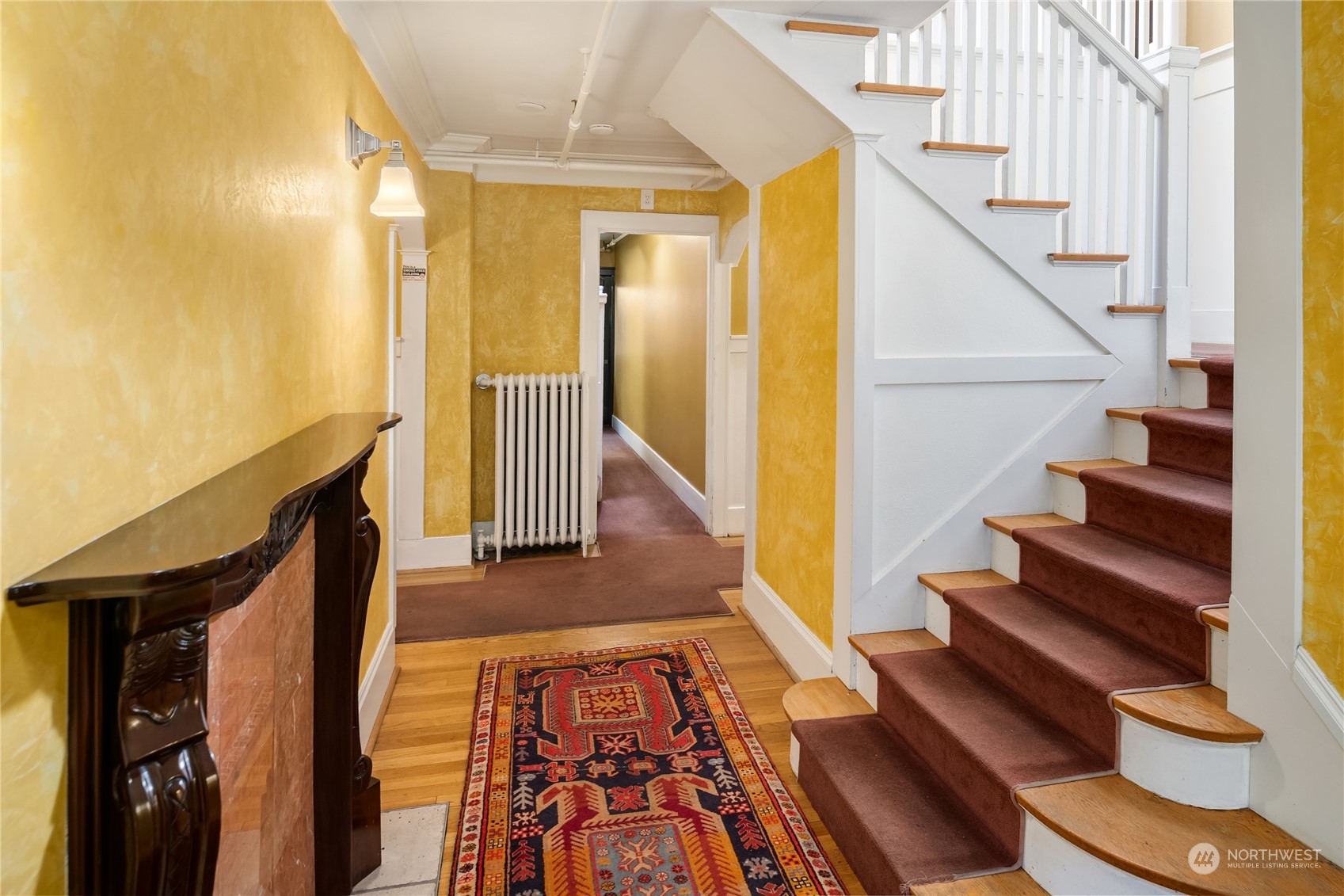 1640 18th Avenue, Unit 5 Seattle, WA 98122 - Photo 16 of 19 a view of stairs and wooden floor