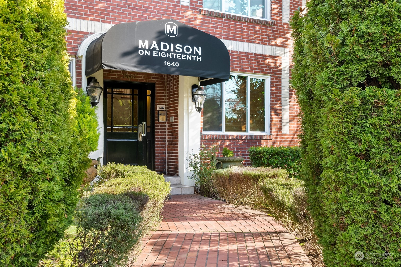 1640 18th Avenue, Unit 5 Seattle, WA 98122 - Photo 19 of 19 a sign on the side of a building