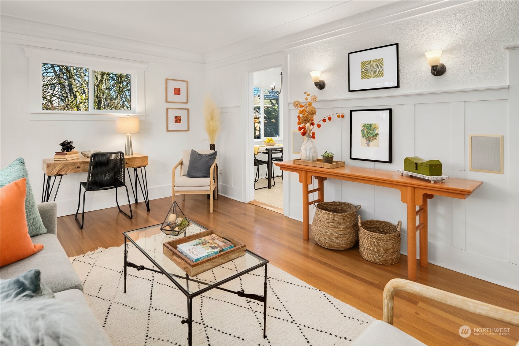 1640 18th Avenue, Unit 5 Seattle, WA 98122 - Photo 4 of 19 a living room with furniture and a table