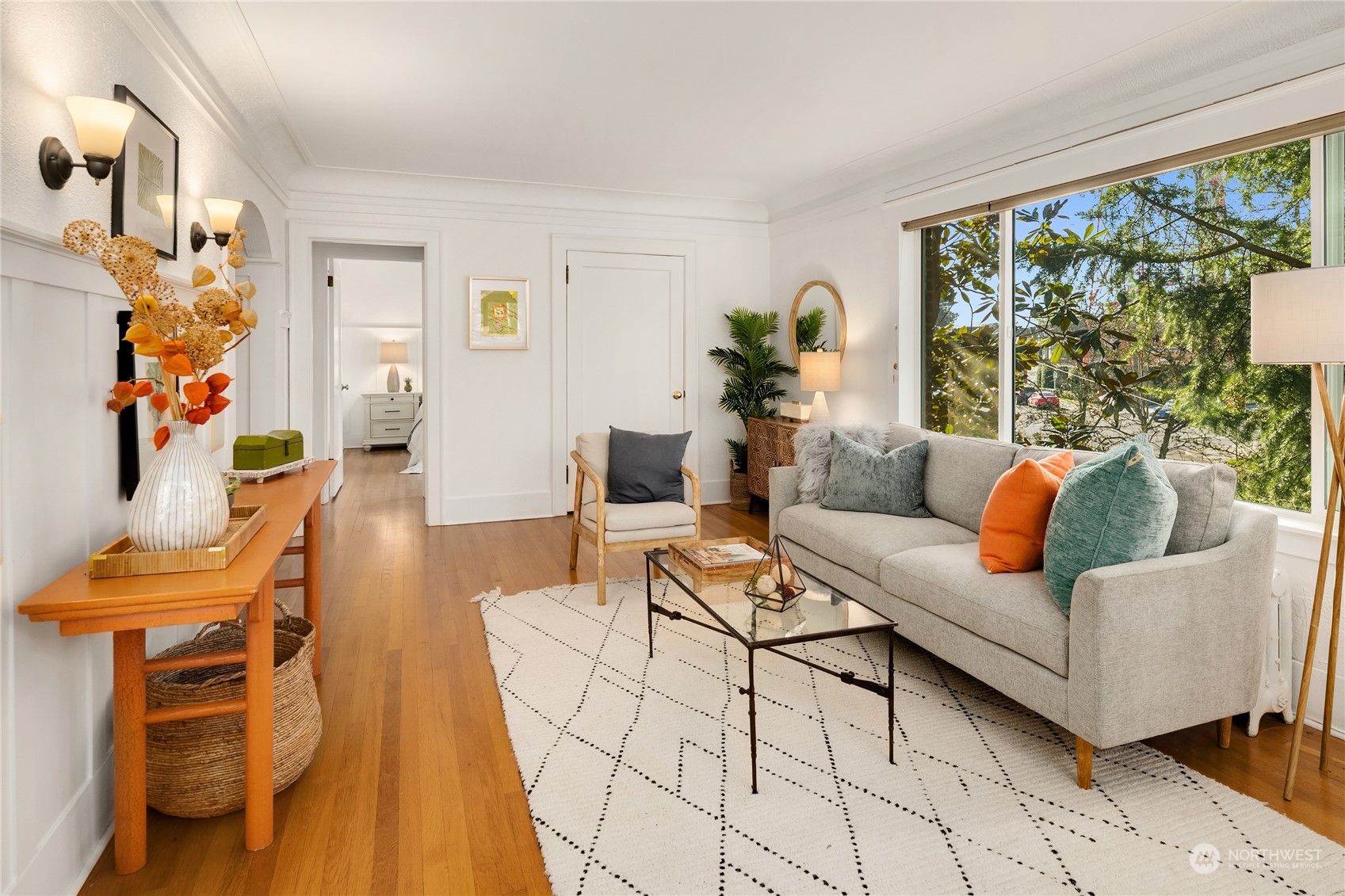 1640 18th Avenue, Unit 5 Seattle, WA 98122 - Photo 5 of 19 a living room with furniture and a large window