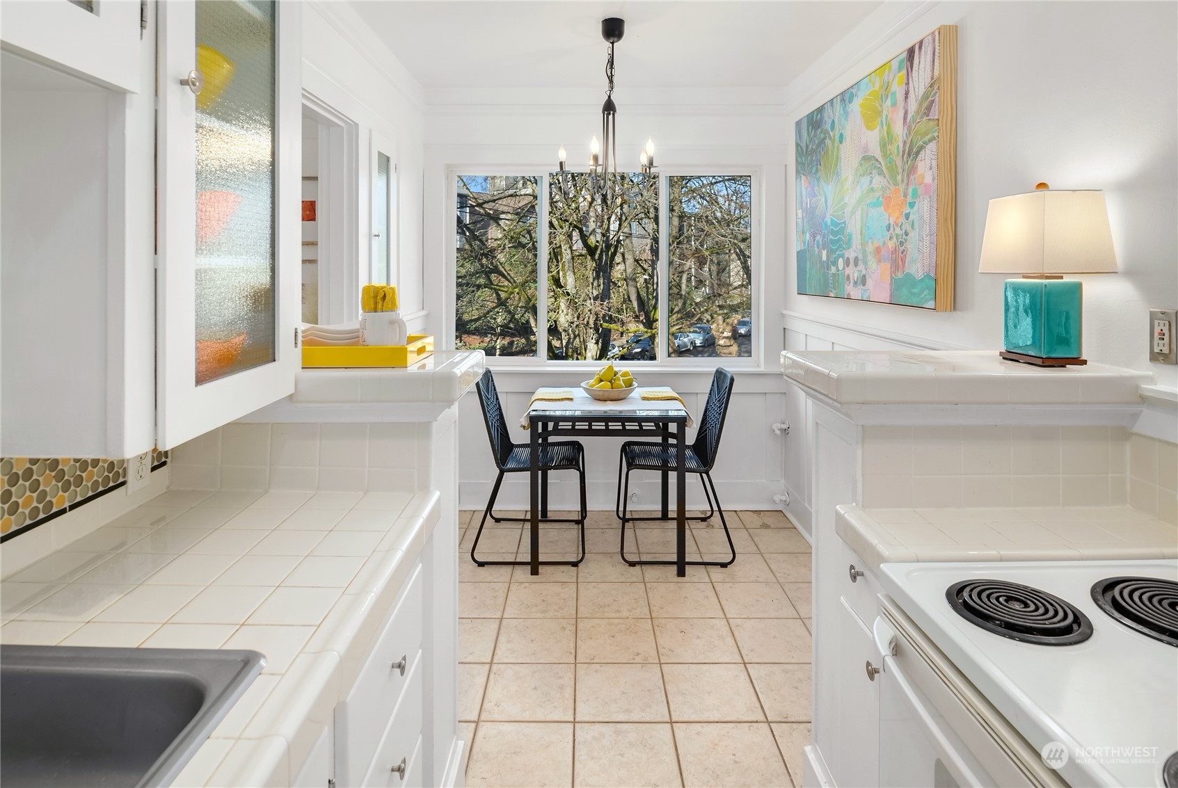 1640 18th Avenue, Unit 5 Seattle, WA 98122 - Photo 10 of 19 a dining room with furniture and window