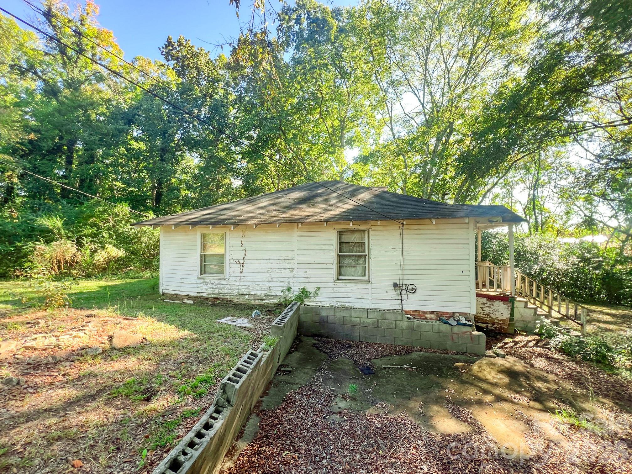 122 Ranson Road Lancaster, SC 29720 - Photo 13 of 19 a view of backyard of house with wooden fence