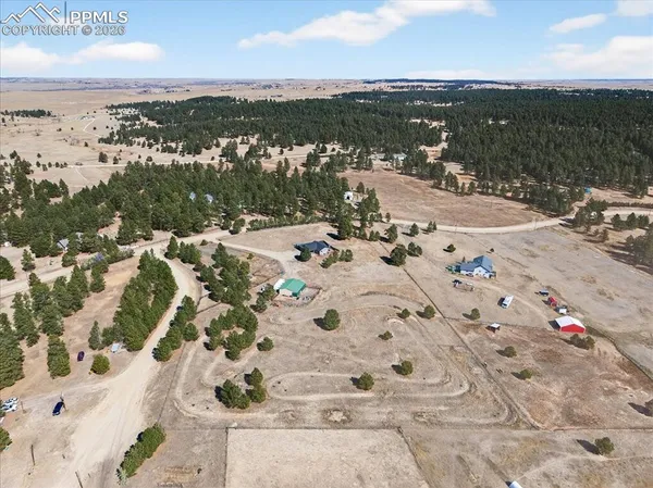 a view of a terrace with chairs