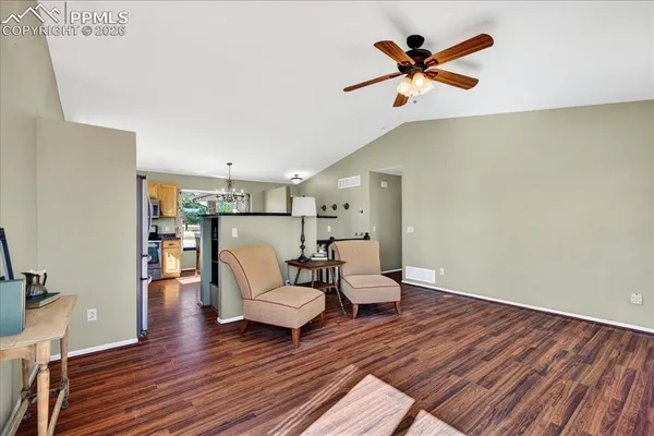 a living room with couches and a coffee table