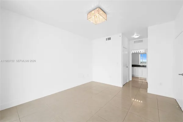 a view of a kitchen with a sink