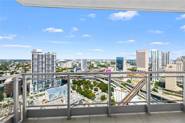 a city view with tall buildings