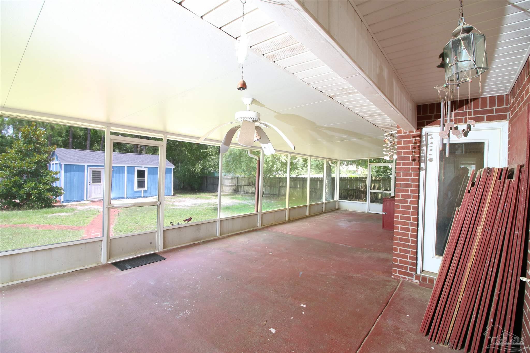 1701 Lighthouse Pointe Drive Gulf Breeze, FL 32563 - Photo 19 of 48 a view of an house with a swimming pool