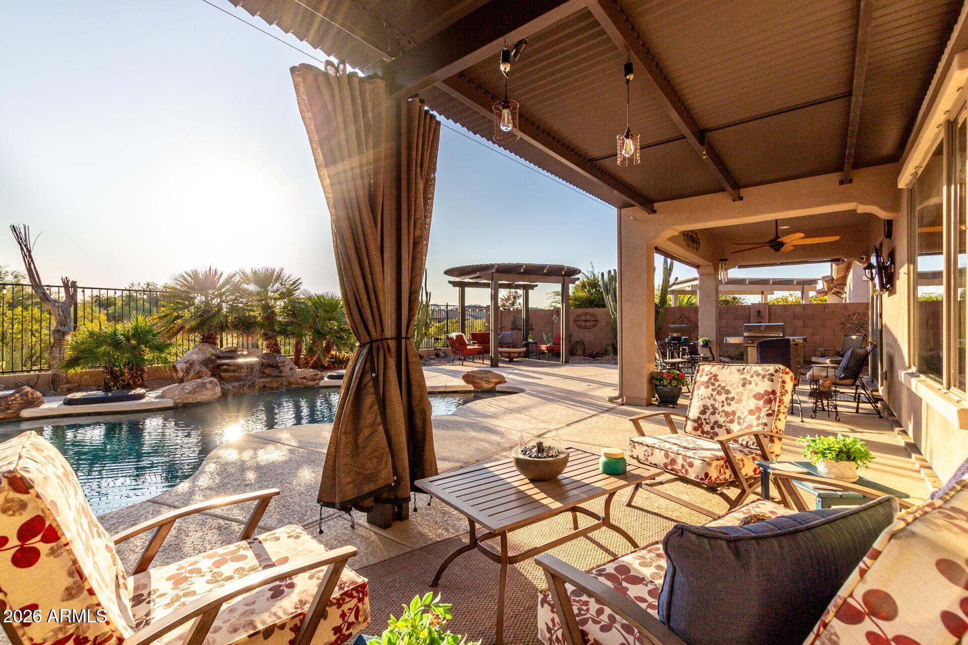 17869 West Verdin Road Goodyear, AZ 85338 - Photo 23 of 39 a view of a patio with swimming pool